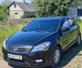Черный Киа Сид, объемом двигателя 1.4 л и пробегом 165 тыс. км за 5700 $, фото 1 на Automoto.ua