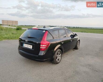 Черный Киа Сид, объемом двигателя 1.59 л и пробегом 207 тыс. км за 5499 $, фото 6 на Automoto.ua