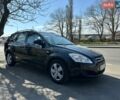 Чорний Кіа Сід, об'ємом двигуна 1.58 л та пробігом 158 тис. км за 6999 $, фото 1 на Automoto.ua