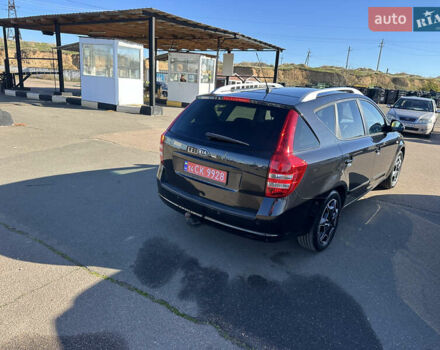 Черный Киа Сид, объемом двигателя 1.4 л и пробегом 182 тыс. км за 6200 $, фото 3 на Automoto.ua