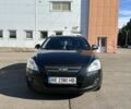 Чорний Кіа Сід, об'ємом двигуна 1.6 л та пробігом 264 тис. км за 6500 $, фото 1 на Automoto.ua