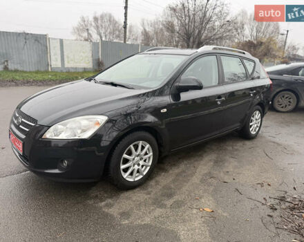 Черный Киа Сид, объемом двигателя 1.4 л и пробегом 204 тыс. км за 6350 $, фото 2 на Automoto.ua