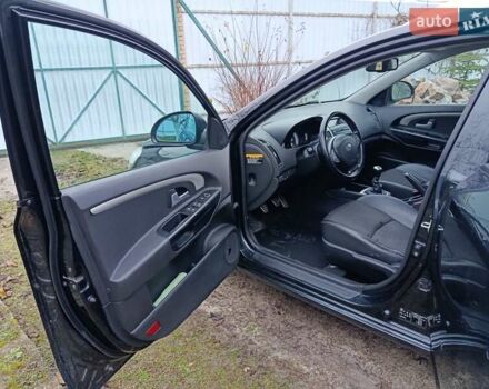 Черный Киа Сид, объемом двигателя 2 л и пробегом 251 тыс. км за 3500 $, фото 15 на Automoto.ua