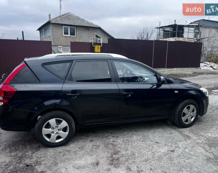 Чорний Кіа Сід, об'ємом двигуна 1.59 л та пробігом 208 тис. км за 6499 $, фото 3 на Automoto.ua