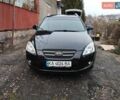 Черный Киа Сид, объемом двигателя 1.4 л и пробегом 320 тыс. км за 4750 $, фото 1 на Automoto.ua