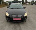 Черный Киа Сид, объемом двигателя 1.4 л и пробегом 185 тыс. км за 6200 $, фото 1 на Automoto.ua