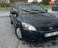 Черный Киа Сид, объемом двигателя 1.4 л и пробегом 280 тыс. км за 5800 $, фото 1 на Automoto.ua