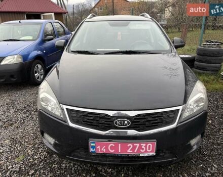 Черный Киа Сид, объемом двигателя 1.4 л и пробегом 220 тыс. км за 5950 $, фото 3 на Automoto.ua