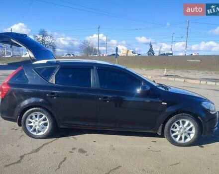 Черный Киа Сид, объемом двигателя 1.4 л и пробегом 200 тыс. км за 5600 $, фото 6 на Automoto.ua