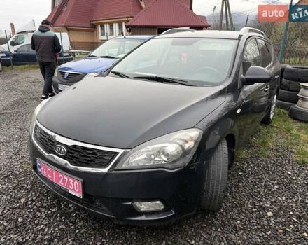 Черный Киа Сид, объемом двигателя 1.4 л и пробегом 220 тыс. км за 5950 $, фото 1 на Automoto.ua