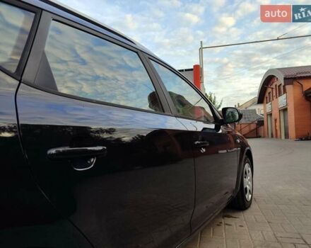 Чорний Кіа Сід, об'ємом двигуна 1.4 л та пробігом 195 тис. км за 5999 $, фото 1 на Automoto.ua