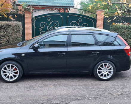 Чорний Кіа Сід, об'ємом двигуна 1.4 л та пробігом 211 тис. км за 6150 $, фото 3 на Automoto.ua