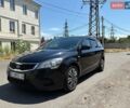 Чорний Кіа Сід, об'ємом двигуна 1.4 л та пробігом 228 тис. км за 5699 $, фото 1 на Automoto.ua