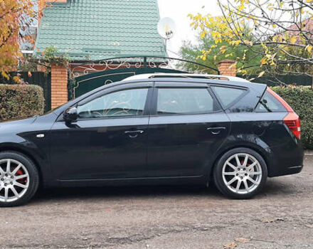 Чорний Кіа Сід, об'ємом двигуна 1.4 л та пробігом 211 тис. км за 6150 $, фото 5 на Automoto.ua