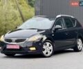 Черный Киа Сид, объемом двигателя 1.4 л и пробегом 220 тыс. км за 6299 $, фото 1 на Automoto.ua