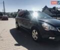 Чорний Кіа Сід, об'ємом двигуна 1.4 л та пробігом 153 тис. км за 7599 $, фото 1 на Automoto.ua