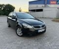 Черный Киа Сид, объемом двигателя 1.4 л и пробегом 200 тыс. км за 5800 $, фото 1 на Automoto.ua
