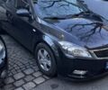 Чорний Кіа Сід, об'ємом двигуна 1.4 л та пробігом 123 тис. км за 5318 $, фото 1 на Automoto.ua