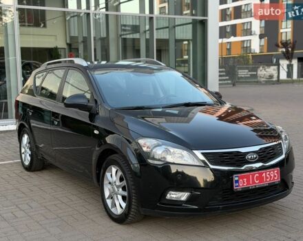 Чорний Кіа Сід, об'ємом двигуна 1.6 л та пробігом 168 тис. км за 8999 $, фото 4 на Automoto.ua