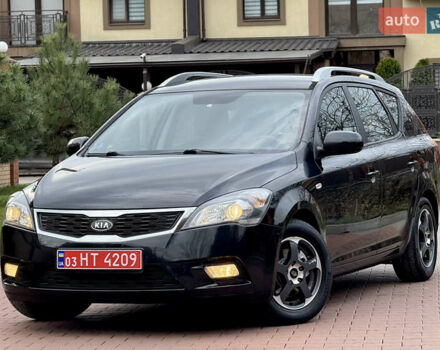 Чорний Кіа Сід, об'ємом двигуна 1.6 л та пробігом 168 тис. км за 7499 $, фото 5 на Automoto.ua