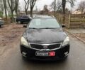 Черный Киа Сид, объемом двигателя 1.6 л и пробегом 198 тыс. км за 6790 $, фото 1 на Automoto.ua