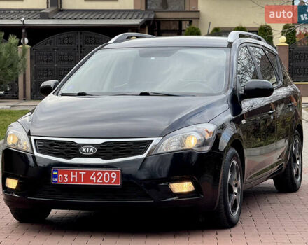 Чорний Кіа Сід, об'ємом двигуна 1.6 л та пробігом 168 тис. км за 7499 $, фото 26 на Automoto.ua