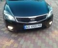 Чорний Кіа Сід, об'ємом двигуна 1.4 л та пробігом 235 тис. км за 7800 $, фото 1 на Automoto.ua