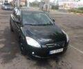 Чорний Кіа Сід, об'ємом двигуна 2 л та пробігом 134 тис. км за 7500 $, фото 1 на Automoto.ua