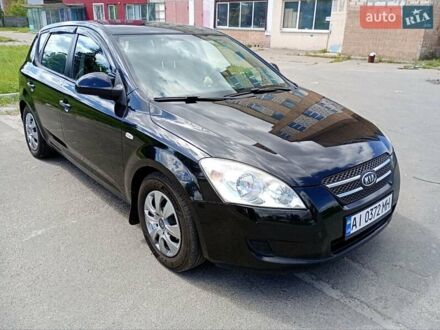 Черный Киа Сид, объемом двигателя 1.4 л и пробегом 180 тыс. км за 5400 $, фото 1 на Automoto.ua