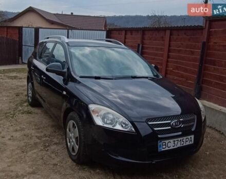 Чорний Кіа Сід, об'ємом двигуна 1.4 л та пробігом 226 тис. км за 5750 $, фото 1 на Automoto.ua