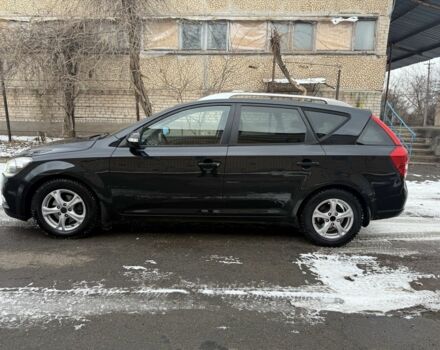 Чорний Кіа Сід, об'ємом двигуна 1.6 л та пробігом 238 тис. км за 6900 $, фото 1 на Automoto.ua