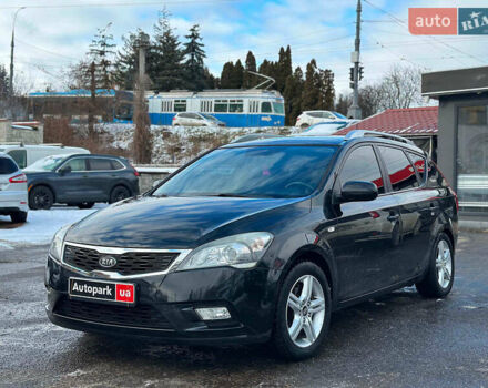 Черный Киа Сид, объемом двигателя 1.4 л и пробегом 209 тыс. км за 6490 $, фото 1 на Automoto.ua