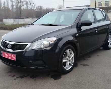 Черный Киа Сид, объемом двигателя 1.4 л и пробегом 215 тыс. км за 6000 $, фото 1 на Automoto.ua