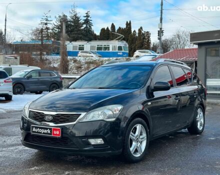 Чорний Кіа Сід, об'ємом двигуна 1.4 л та пробігом 209 тис. км за 6490 $, фото 1 на Automoto.ua