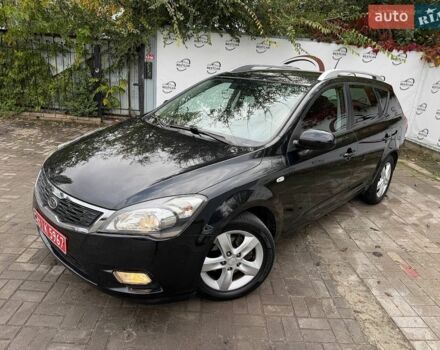 Чорний Кіа Сід, об'ємом двигуна 1.4 л та пробігом 180 тис. км за 6500 $, фото 1 на Automoto.ua