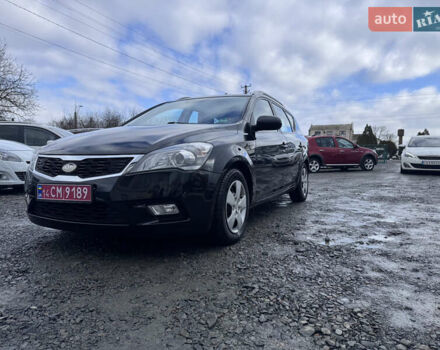 Чорний Кіа Сід, об'ємом двигуна 1.6 л та пробігом 200 тис. км за 6990 $, фото 1 на Automoto.ua