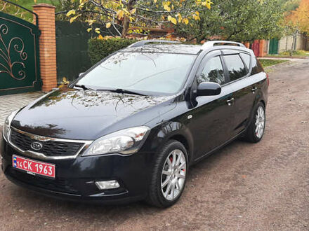 Чорний Кіа Сід, об'ємом двигуна 1.4 л та пробігом 211 тис. км за 6150 $, фото 1 на Automoto.ua