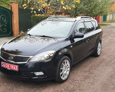 Чорний Кіа Сід, об'ємом двигуна 1.4 л та пробігом 211 тис. км за 6150 $, фото 1 на Automoto.ua