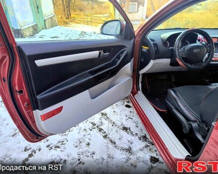 Красный Киа Сид, объемом двигателя 2 л и пробегом 220 тыс. км за 5000 $, фото 10 на Automoto.ua