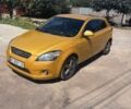 Желтый Киа Сид, объемом двигателя 1.6 л и пробегом 229 тыс. км за 6150 $, фото 1 на Automoto.ua