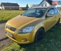 Желтый Киа Сид, объемом двигателя 2 л и пробегом 180 тыс. км за 6000 $, фото 1 на Automoto.ua