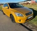 Желтый Киа Сид, объемом двигателя 2 л и пробегом 182 тыс. км за 6000 $, фото 1 на Automoto.ua