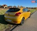 Желтый Киа Сид, объемом двигателя 2 л и пробегом 180 тыс. км за 6000 $, фото 5 на Automoto.ua