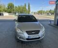 Серый Киа Сид, объемом двигателя 1.59 л и пробегом 210 тыс. км за 6999 $, фото 3 на Automoto.ua