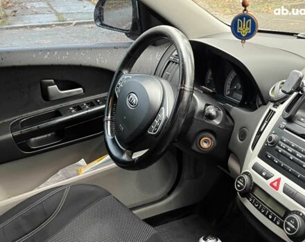 Серый Киа Сид, объемом двигателя 1.6 л и пробегом 227 тыс. км за 5590 $, фото 17 на Automoto.ua