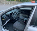 Серый Киа Сид, объемом двигателя 1.4 л и пробегом 215 тыс. км за 5499 $, фото 5 на Automoto.ua