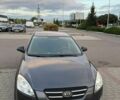 Серый Киа Сид, объемом двигателя 1.4 л и пробегом 249 тыс. км за 5500 $, фото 1 на Automoto.ua