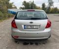Серый Киа Сид, объемом двигателя 1.4 л и пробегом 254 тыс. км за 4900 $, фото 5 на Automoto.ua