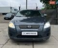 Серый Киа Сид, объемом двигателя 1.4 л и пробегом 247 тыс. км за 4990 $, фото 1 на Automoto.ua