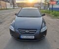 Серый Киа Сид, объемом двигателя 1.59 л и пробегом 253 тыс. км за 5900 $, фото 1 на Automoto.ua